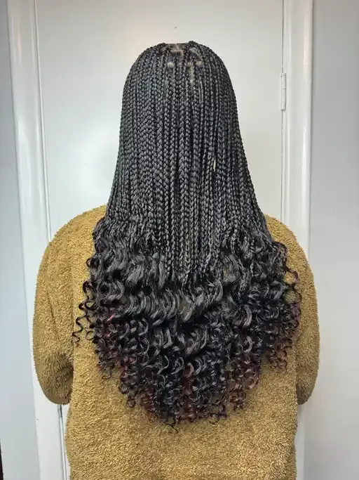 Finished knotless braids with polished edges.